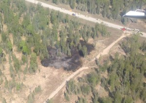 The Escape Route Road Fire started as a grass fire and spread to nearby spruce trees in Nikiski on Thursday, May 28, 2015. Division of Forestry dispatched engines, helitack, Prevention and air attack to work with Nikiski Fire Department to supress the fie. The .83 acres fire is contained, controlled and placed in monitor status. The fire was caused by an exploding shooting target. Jason Jordet Division of Forestry photo