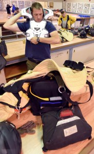 Smokejumpers from BLM Boise, Idaho, prepare to make their practice jump Saturday afternoon, May 23, 2015, at the BLM Alaska Smokejumpers Base on Ladd Air Field at Fort Wainwright. Because of high fire danger in Alaska, 16 additional smokejumpers were brought to the state. Once the crews from Boise have completed their orientation to Alaska they will enter into the fire assignment rotation. Red Flag Warnings are forecasted to remain in effect for the Interior of Alaska through the Memorial Holiday weekend. Sam Harrel BLM-AFS photo