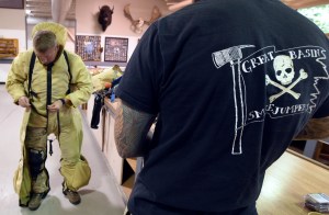 Smokejumpers from BLM Boise, Idaho, prepare to make their practice jump Saturday afternoon, May 23, 2015, at the BLM Alaska Smokejumpers Base on Ladd Air Field at Fort Wainwright. Because of high fire danger in Alaska, 16 additional smokejumpers were brought to the state. Once the crews from Boise have completed their orientation to Alaska they will enter into the fire assignment rotation. Red Flag Warnings are forecasted to remain in effect for the Interior of Alaska through the Memorial Holiday weekend. Sam Harrel BLM-AFS photo