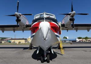 Aero Flite's water bomber, a Bombardier CL-415 Superscooper, sits on the BLM-Alaska Fire Service tarmac at Ladd Field on Tuesday, May 19, 2015, at Fort Wainwright. This plane can scoop more than 1,600 gallons of water during a 12 second pass, skimming across the surface of a lake. The plane based out of Spokane, Wash., is piloted by Capt. Denis Boulanger and Capt. Peter Crosby. Mechanics Drew Kristof and Mike Flores also accompany the plane while on assignment. Sam Harrel BLM-AFS photo