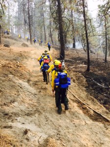 The Allakaket Type 2 Crew hikes up a steep hill on the way to work in the Clearwater Complex in northwest Idaho on Tuesday. Photo by Steve Theisen