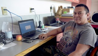 BLM-Alaska Fire Service Information Technology Specialist Calvin Moses served as an Incident Technology Support Specialist for the McHugh Fire near Anchorage on Thursday, July 28, 2016. Photo by Sam Harrel/Alaska Division of Forestry