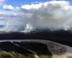 The 21,366-acre Mooseheart Fire (#204) is burning 13 miles southwest of Manley Hot Springs. This photo is taken from the north side of the Tanana River. Photo by Cody Nelson, BLM AFS