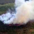 The Dome Creek Fire (#361) is burning in the Yukon-Charley Rivers National Preserve near several structures including cabins left from the Gold Rush days. Photo by Dustin Wessel, BLM AFS.
