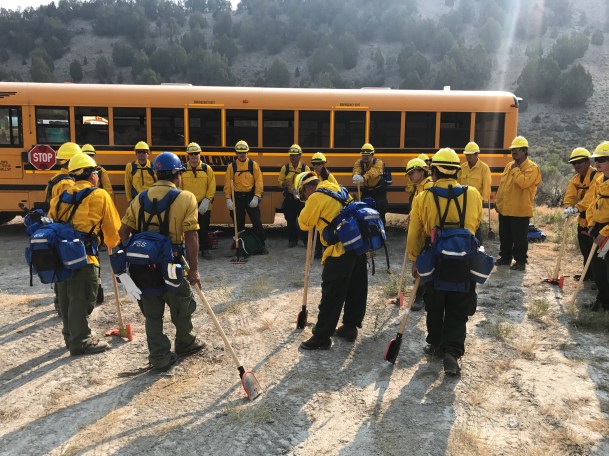 Photo of the Yukon Flats Crew during a morning briefing on Aug. 12, 2018. Photo by Branden Petersen, BLM AFS