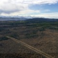 Smoke is visible on the northeast corner in this photo taken on May 11, 2019 while facing south from over the winter trail. The Delta Creek is in the northeast corner. Photo by Branden Kobayashi/Isaiah Fisher, BLM AFS