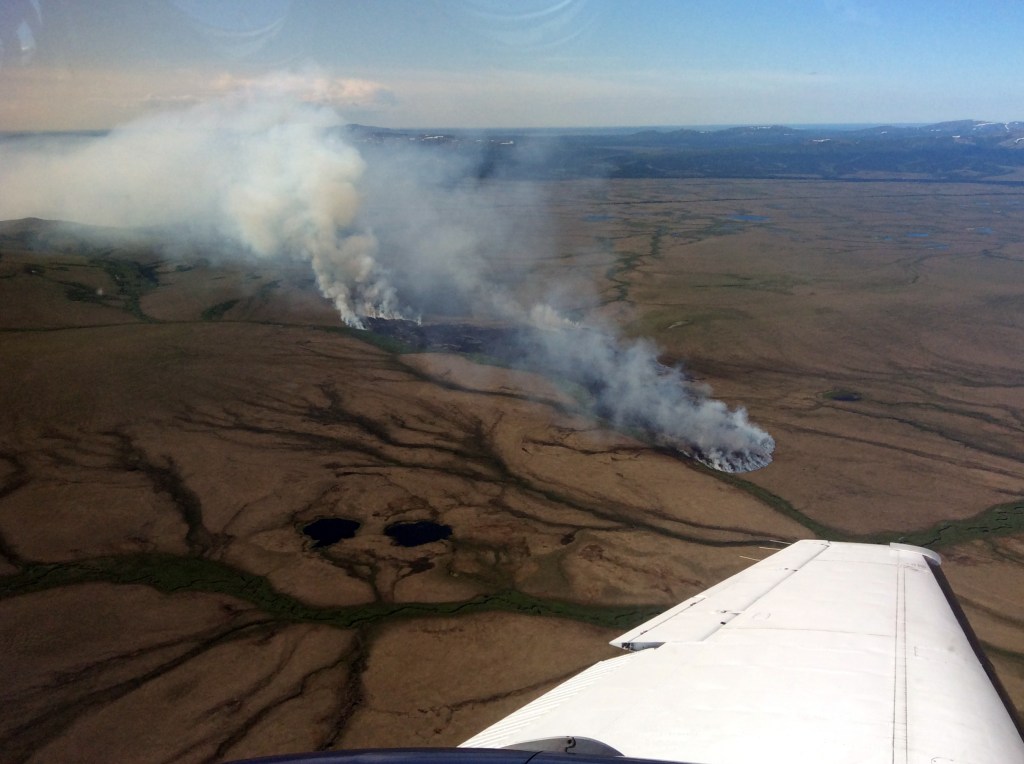 Photo of the Kuyukutuk Fire (#224) is burning in tundra about 17 miles north of Russian Mission and Marshal on June 10, 2019. It is estimated to be 15 acres in size.