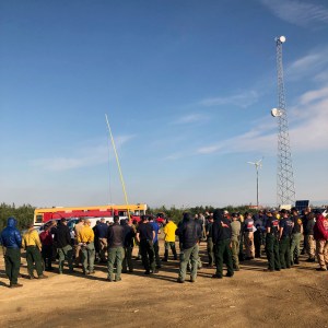 Firefighters gather for the morning briefing for the Shovel Creek Fire near Murphy Dome on Tuesday morning, June 25, 2019. Photo by Sarah Saarloos. 