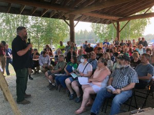 Norm McDonald, incident commander for the Alaska Type 2 Green Incident Management Team, addresses a crowd of about 180 people at a community meeting regarding the Shovel Creek Fire at the Ken Kunkel Community Center on Wednesday night, June 26, 2019. Photo by Tim Mowry/Alaska Division of Forestry