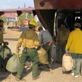 Fire Crews Load "Backhaul" into a Support Airplane in Chalkyitsik, Alaska