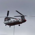 A Chinook helicopter delivers water to the Swan Lake Fire near Sterling, AL.