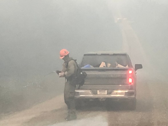 Smoke impacts the fire crews working on Murphy Dome Road. 
Photo Credit:Kale Casey/PNW2/DNR Alaska Division of Forestry
 
