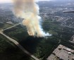 Smoke rises from a wildfire in East Anchorage on Tuesday afternoon, July 2, 2019. Photo by Jason Jordet/Alaska Division of Forestry