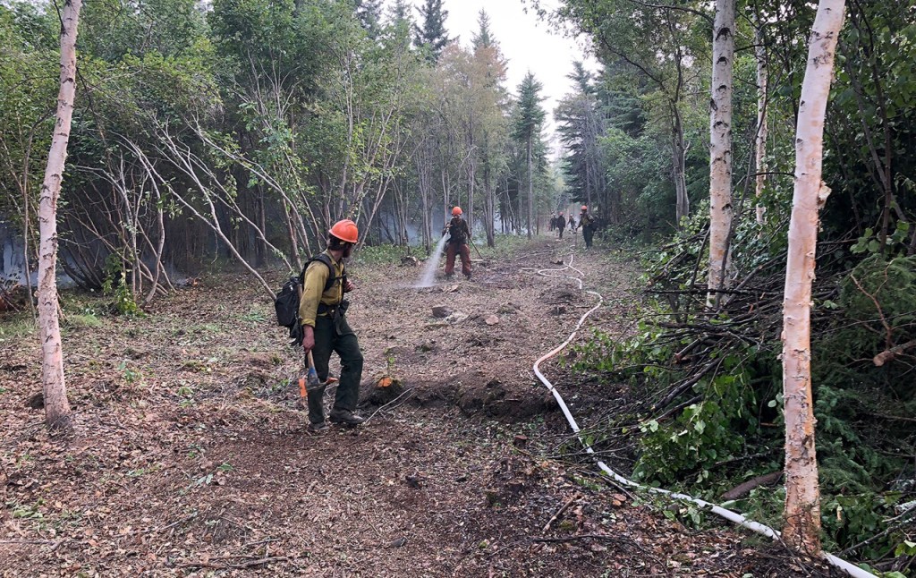 North Star crew wet down their saw line in preparation of a burnout, July 23, 2019