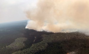 The Rainbow 2 Fire west of Delta Junction puts up a large plume of smoke on Monday, July 8, 2019. Photo by Mike Goyette/Alaska Division of Forestry