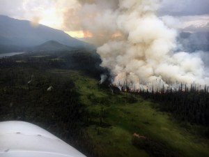 A smoke plume from the Rainy Pass Fire (#664) as seen at around 9 p.m. Tuesday, July 23, 2019. Phot oby Alaska Division of Forestry Air Attack