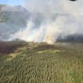 Smoke observed by firefighters in the Mystery Creek drainage during a monitoring flight of the Swan Lake Fire on Friday, August 9, 2019. Photo by Nick Adamson/Alaska Division of Forestry