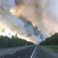 A smoke plume from the McKinley Fire burning along the Parks Highway seen from the highway on Sunday. Photo by Maureen Clark/Alaska Division of Forestry