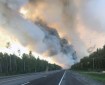 A smoke plume from the McKinley Fire burning along the Parks Highway seen from the highway on Sunday. Photo by Maureen Clark/Alaska Division of Forestry