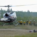 Helicopter Lands to Pick Up Fire Crews