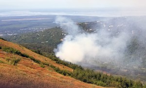An aerial photo of the Steeple Fire burning east of Eagle River on Monday, August 12, 2019. Firefighters from the Mat-Su Area Forestry are hiking into the fire, which is located on Mount Baldy, about one-half mile from Steeple Drive. Photo by Mat-Su Area helitack.
