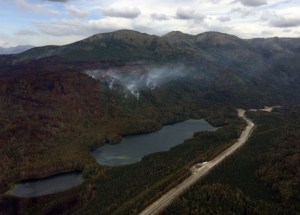 Smoke from the east side of the Swan Lake Fire rises above Upper Jean Lake along the Sterling Highway on Thursday, August 16, 2019.  Photo by Brentwood Reid/Alaska Division of Forestry