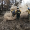 Firefighters mopping up in the deep ash pits on McKinley Fire. Photo credit: Bruce Giersdorf