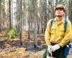 Photo of emergency firefighter on the looking for spot fires.