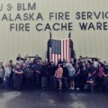 Staff stands in front of the BLM AFS Cache
