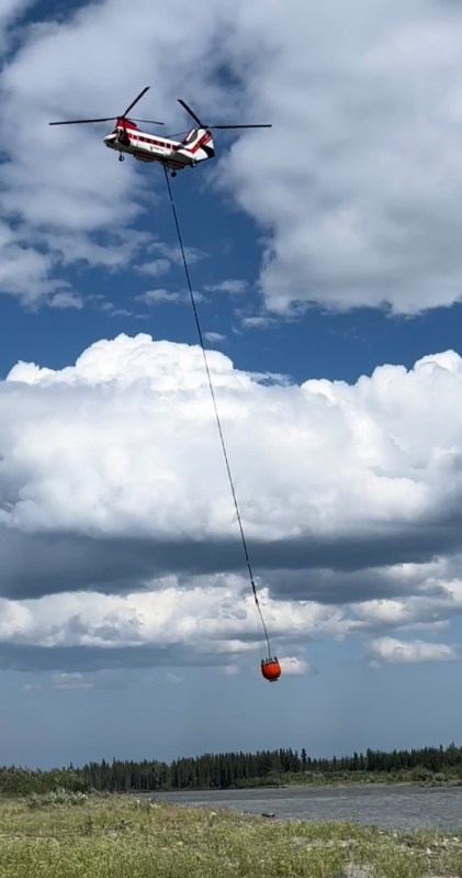 A Type 1 helicopter retrieves water to drop on the Clear Fire on 7/7/22