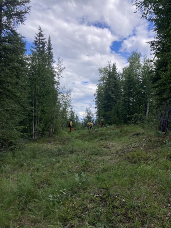 Firefighters with the Teton Helitack module working on the southern area of Allakaket.