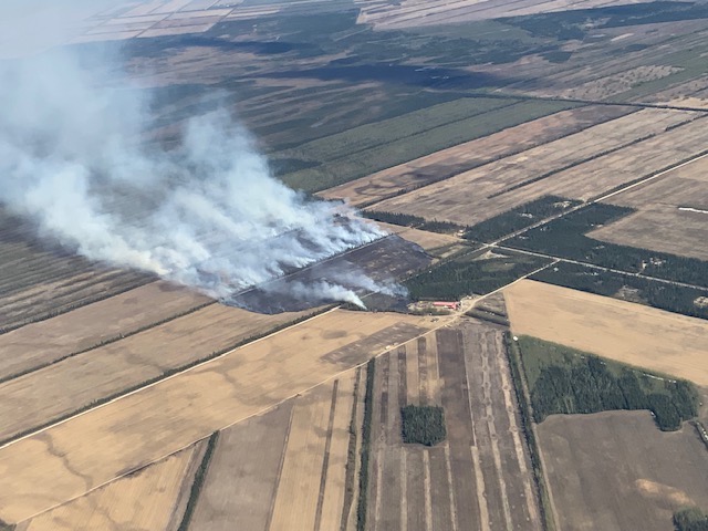 Aerial view of the Barley Way Fire burning through agricultural fields in Delta on May 20. 