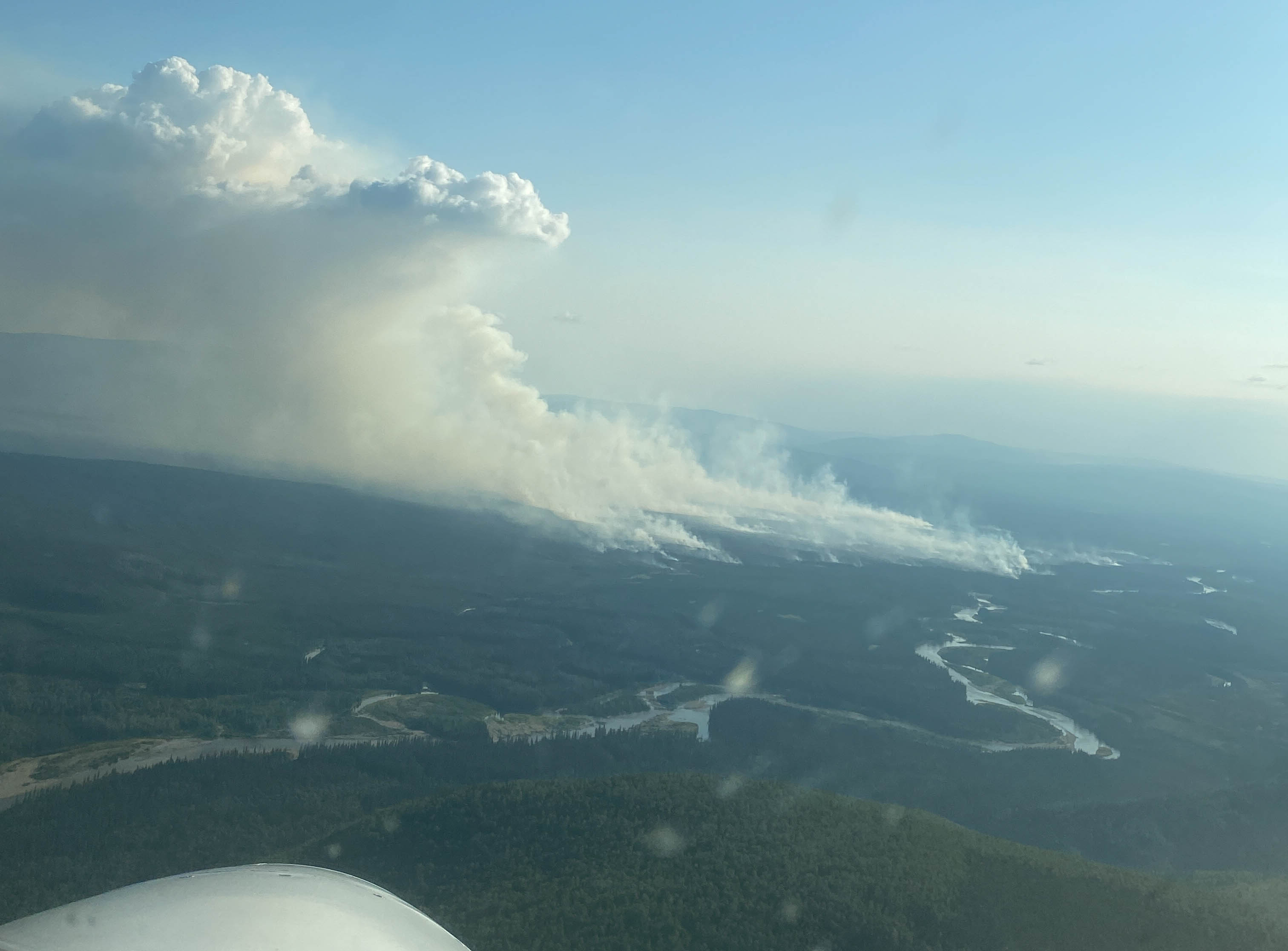 Air attack flies towards the McCoy Creek Fire (#201) along the Teklanika River on Monday evening, July 31. Photo/ Brittany Stillie, AK DOF