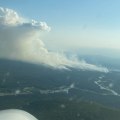 Air attack flies towards the McCoy Creek Fire (#201) along the Teklanika River on Monday evening, July 31. Photo/ Brittany Stillie, AK DOF
