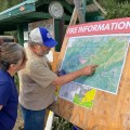 Haystack Subdivision residents share information at the new Information Boards.
