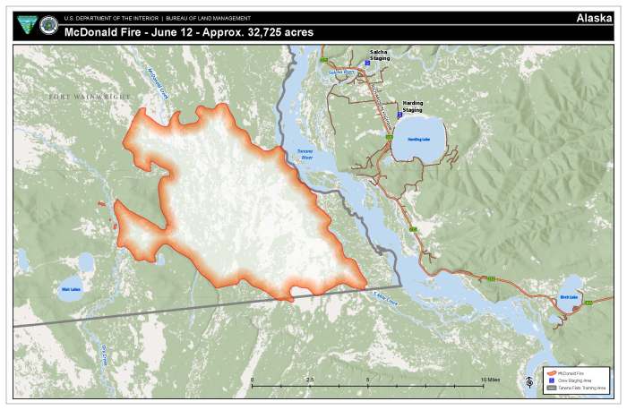 Colorful map showing fire perimeter of fire west of the river.