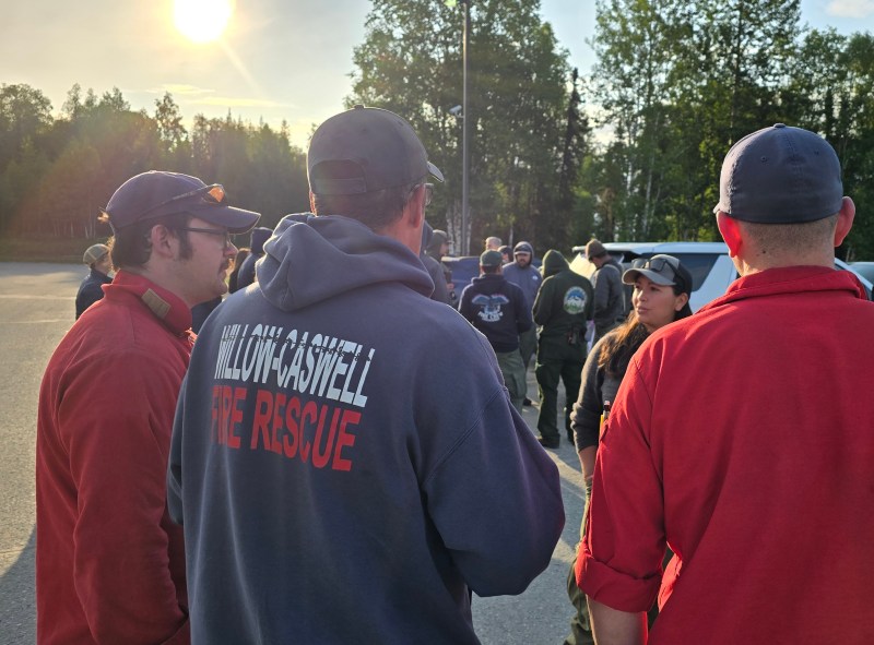 Crews at morning briefing at Susitna Valley High School.