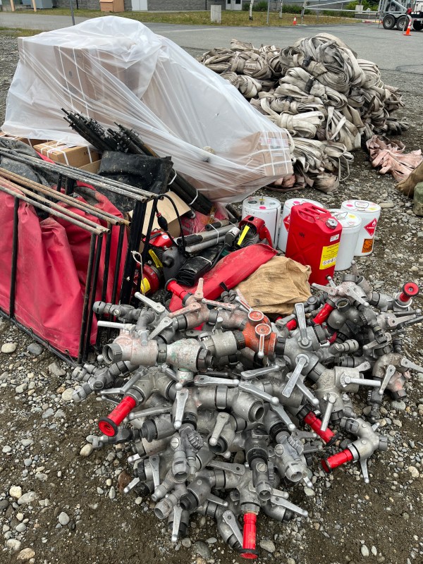 Crews begin hauling back equipment.