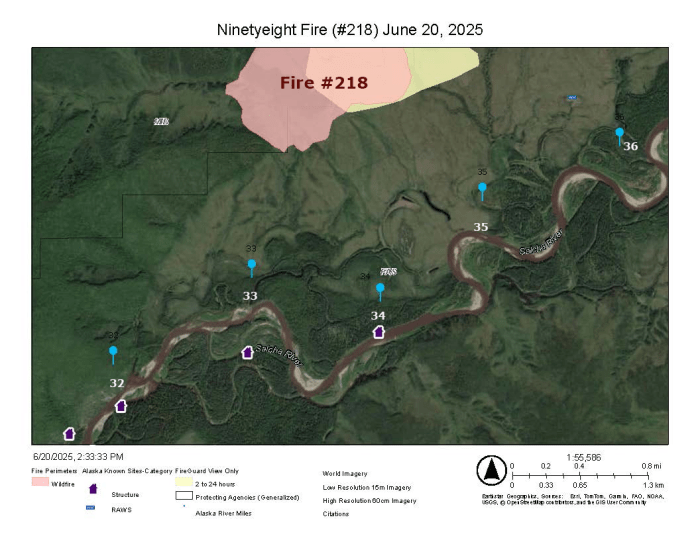 A map showing a fire in red in relation to a windy river surrounded by green vegetation.