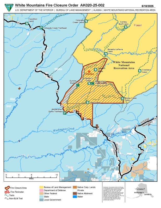 Map showing an area in yellow, and area with red lines through it for the fire closure surrounded by blue.