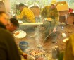 Firefighters eating and cooking food