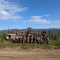 Fire personnel working on the Aggie Creek Fire posing with the Nodwell Crew machinery. July 26,2025