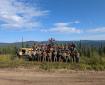 Fire personnel working on the Aggie Creek Fire posing with the Nodwell Crew machinery. July 26,2025
