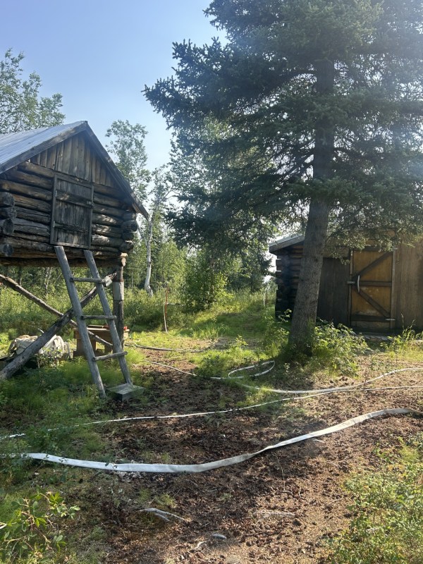 A hose lay installed around structures as part of the point protection measures being taken.