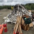 Equipment and supplies used on the fires are piled up to be back hauled.