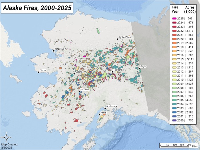 Map of Alaska fire history from 2000 through Aug. 8, 2025 with a variety of colors assigned to fire perimeters for each year. A rainbow of odd shaped spots that mostly fall between two shaded mountain ranges.