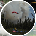 Graphic featuring five photos of Alaska smokejumpers in action from looking out of an airplane at the fire on the ground, to jumping out of an airplane, to a parachuted descent with a smoke column in the background, and firefighters using beaters to try to beat out the edges of a tundra fire.