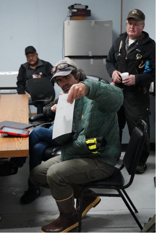 Jon Cox showing the form that is being used to assess homes.
