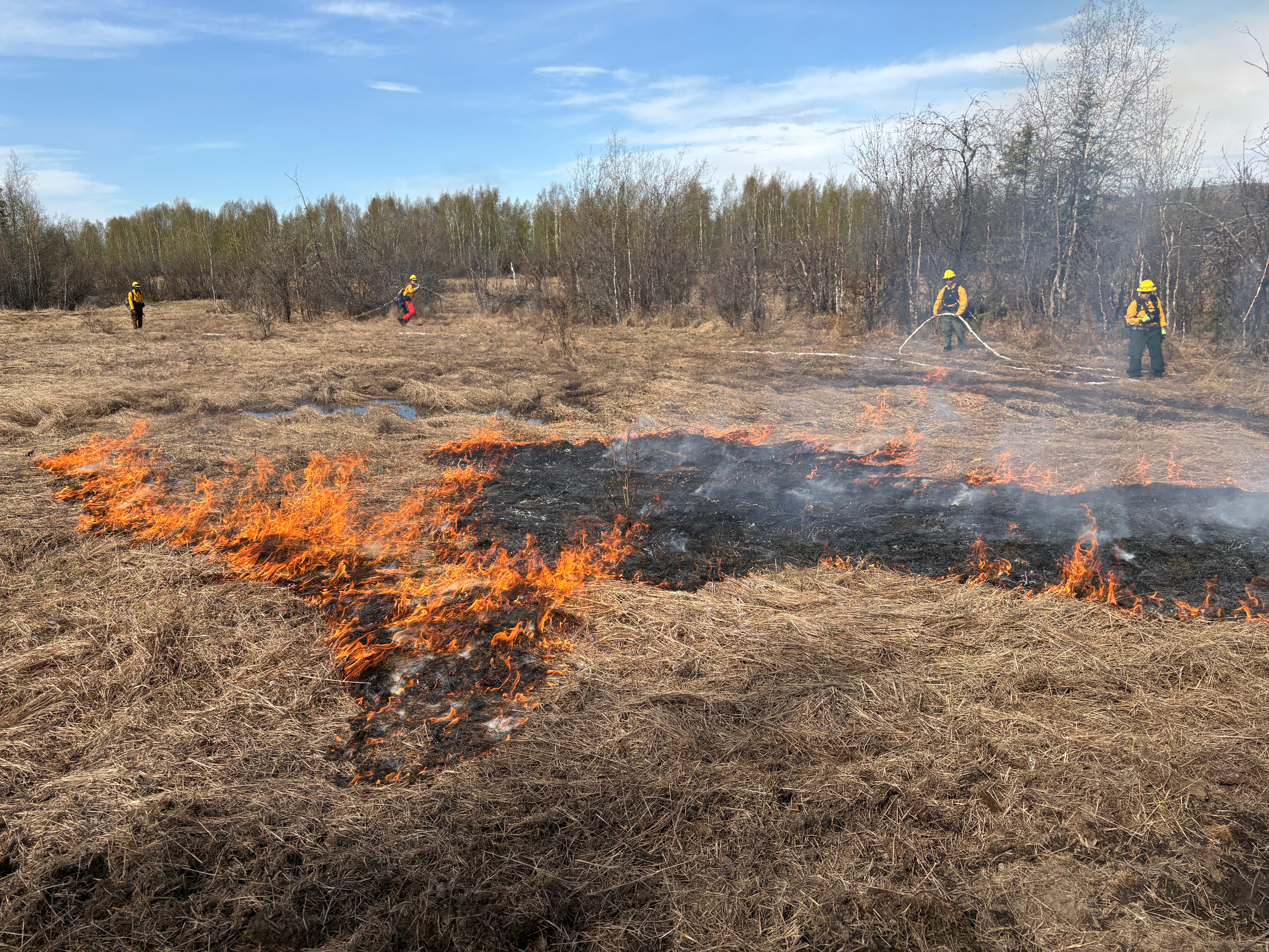 White Mountain Fire Crew Holding the wet line and watching the green at the Creamers Field Echo Acres RX 2026