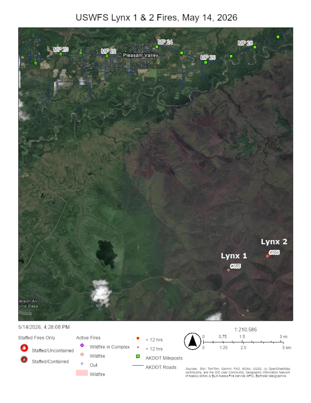 Map showing the location of two fires as red dots located about 9 miles south of a community.